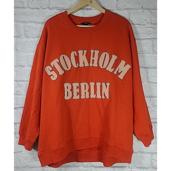 H&M Stockholm Berlin Oversized Sweatshirt Womens Medium Orange Spellout Textured - Picture 1 of 5